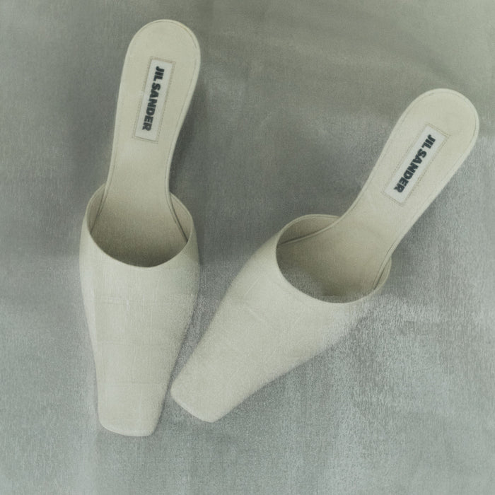 27 JIL SANDER IVORY CROC-EMBOSSED MULES