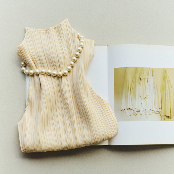 28 FAITH BOOK - ISSEY MIYAKE PLEATS PLEASE TOP - VINTAGE PEARL NECKLACE