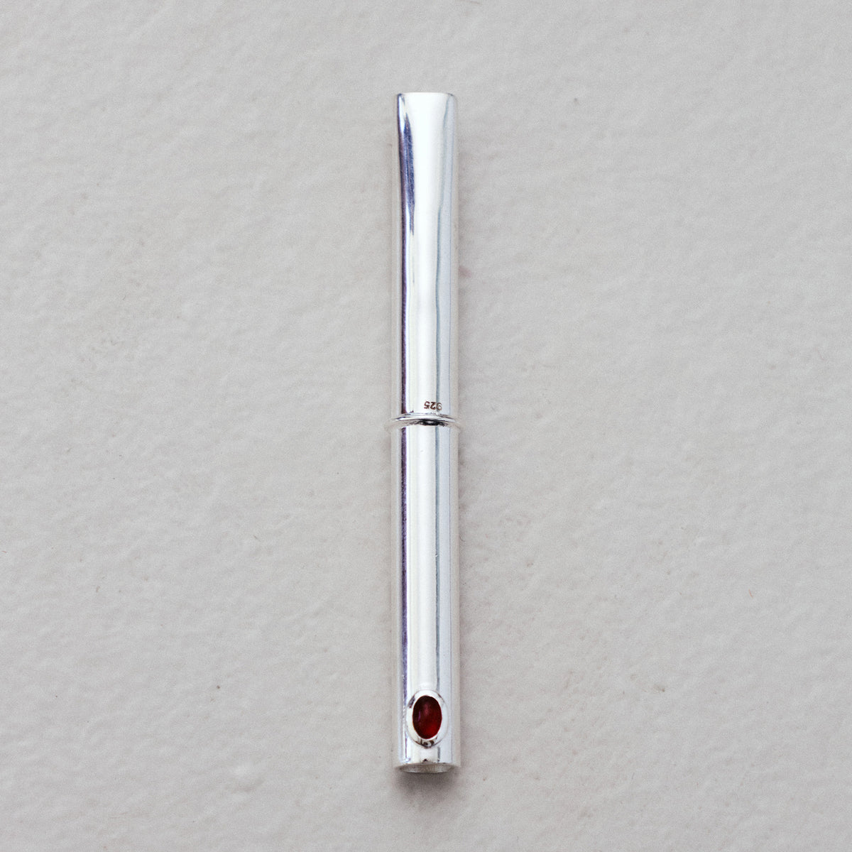 THE CIGARETTE HOLDER