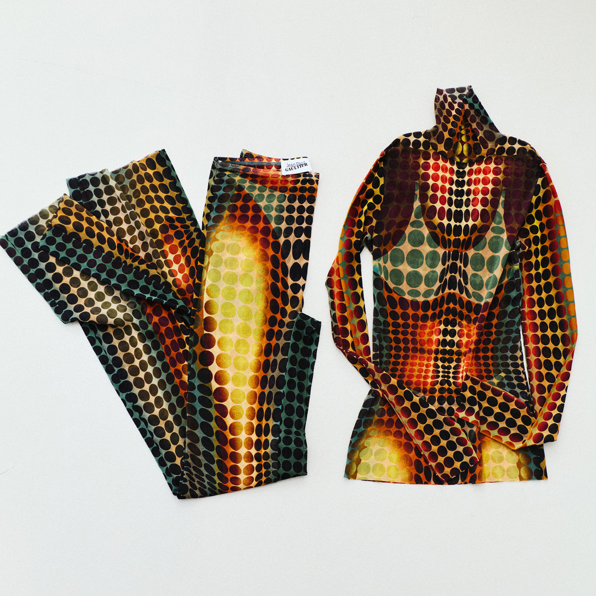 JEAN PAUL GAULTIER: POLKA DOT TROMPE L'ŒIL FLARED MESH PANTS