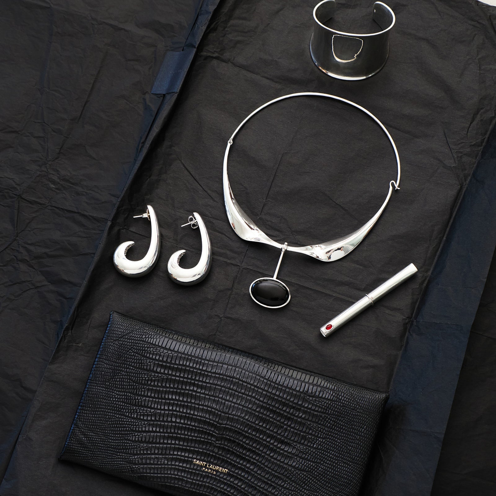THE CIGARETTE HOLDER