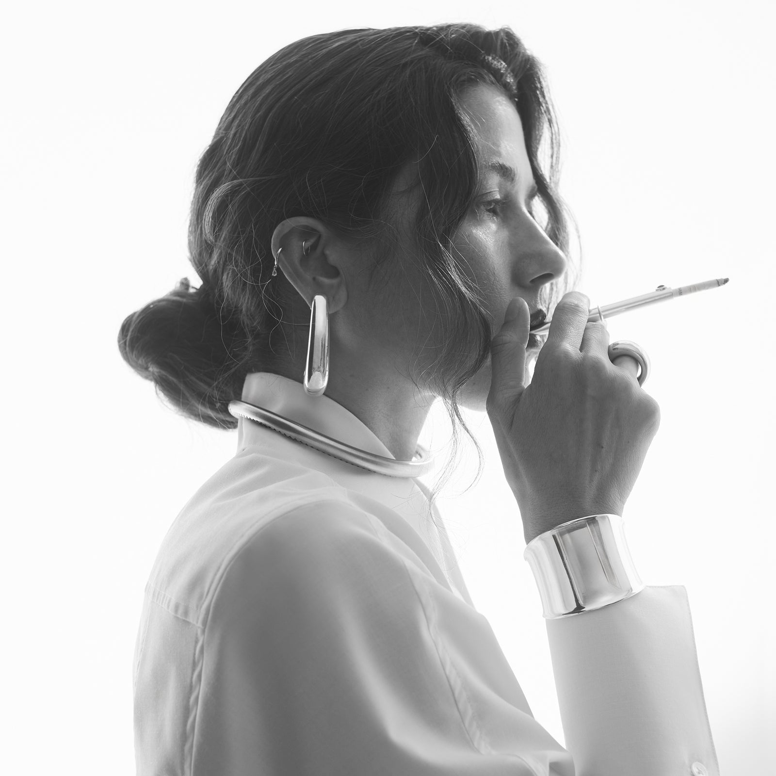 THE CIGARETTE HOLDER
