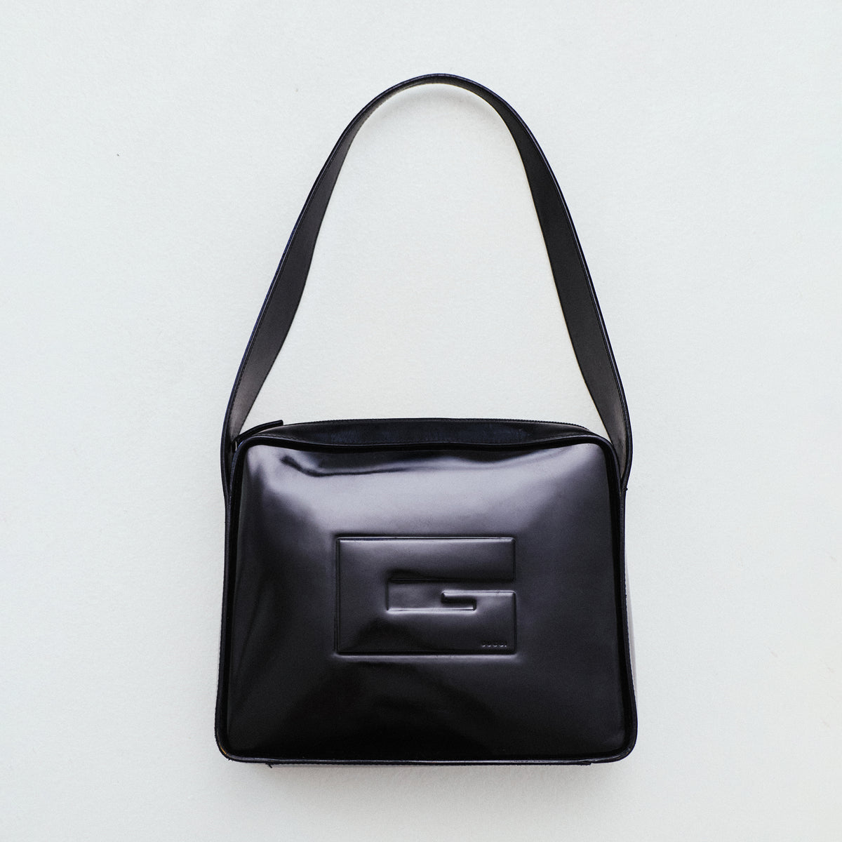 GUCCI EMBOSSED G LEATHER SHOULDER BAG