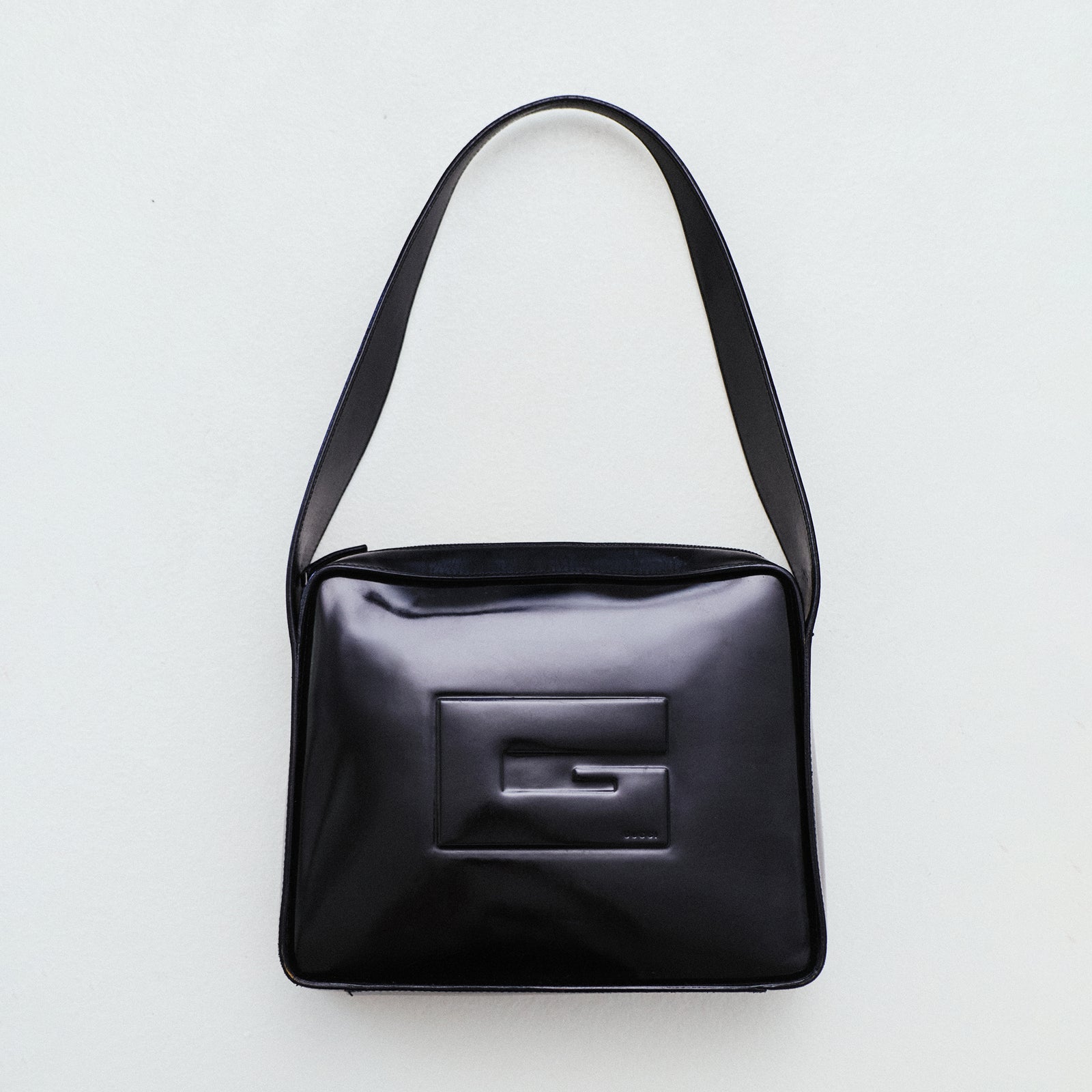 GUCCI EMBOSSED G LEATHER SHOULDER BAG